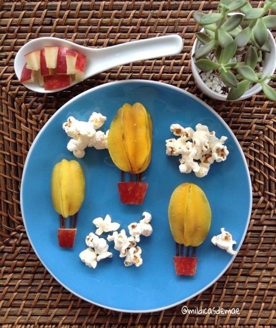 Frutas e pipoca compõem um prato cheio de encanto (Foto: Reprodução)